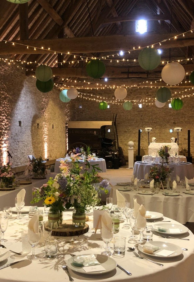 Green lanterns and fairy lights with light curtain backdrop