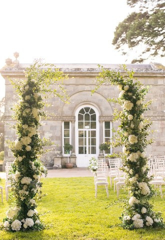 An outdoor wedding ceremony set up at Margam Orangery, South Wales