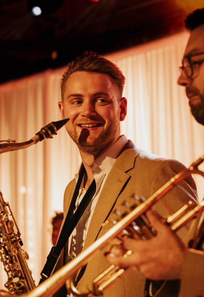 Saxophone and trumpet players