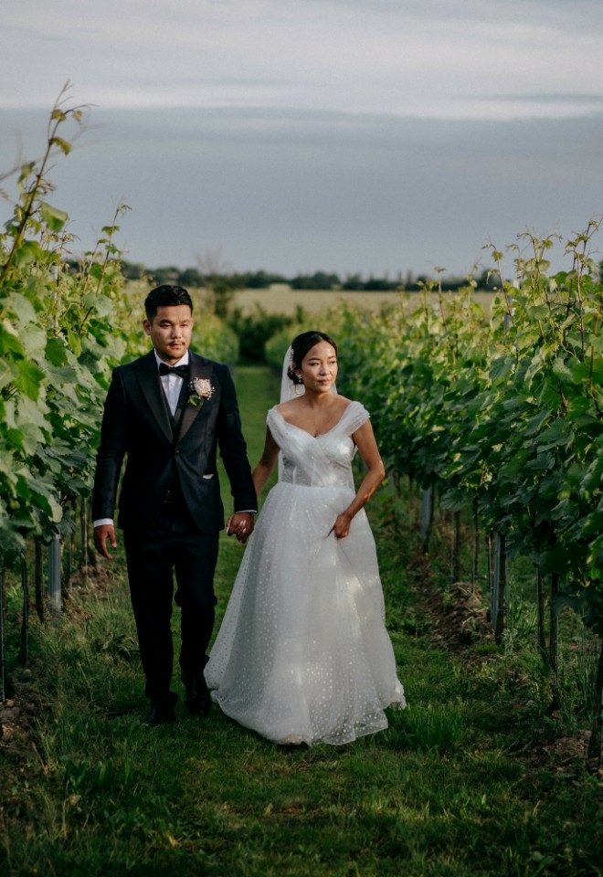 Wedding couple photo in the vineyard at High House wedding venue Essex