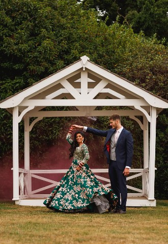 Bride and groom share a dance at De Vere Wokefield Estate, Berkshire