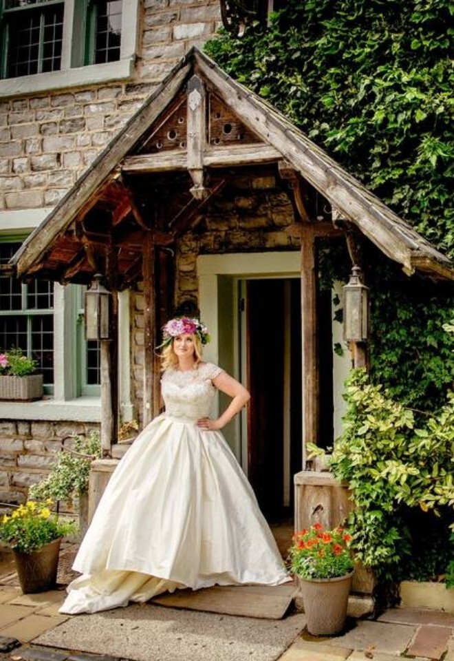Bride in the doorway of The Spread Eagle, Sawley, near Clitheroe