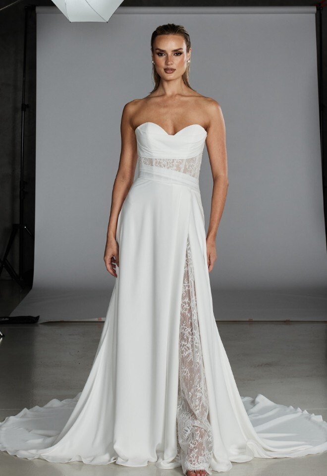 Soft a-line wedding dress with lace split and cut out detail on the bodice. Your Story Bridal, Marlow