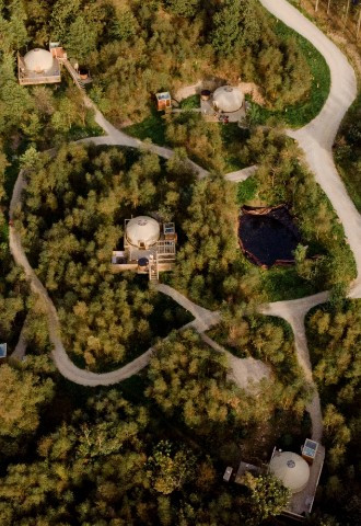 Eavestone lake aerial view tree yurts