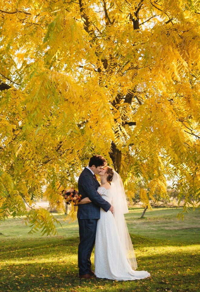 Autumn wedding with yellow leaves at Huntsmill Farm