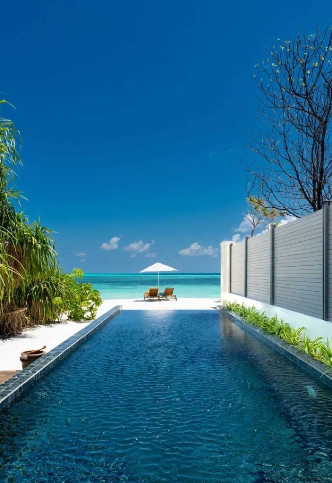 Luxury Maldives private pool villa with direct beach access, perfect for a bespoke honeymoon with Mantas & Herons.