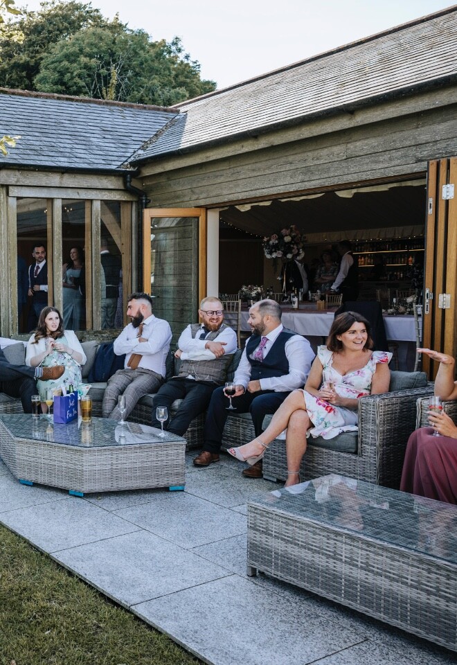 Terrace seating, outdoors barn wedding 