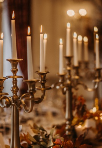 Candlelit table setting at Auchen Castle - a romantic castle wedding venue in Scotland