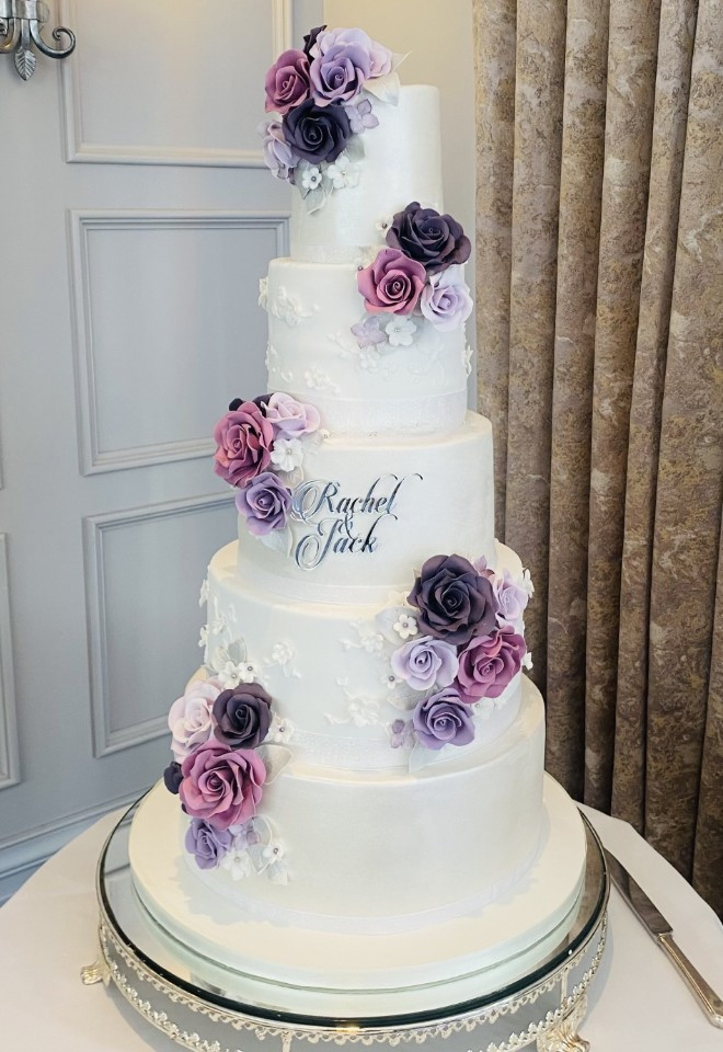 5 tier wedding cake with sugar flowers