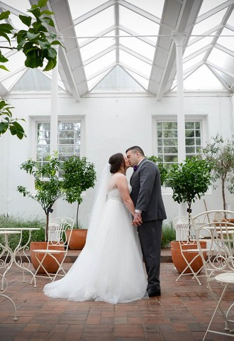 bride and groom sharing a kiss during their wedding photography at culzean castle wedding venue in ayrshire scotland