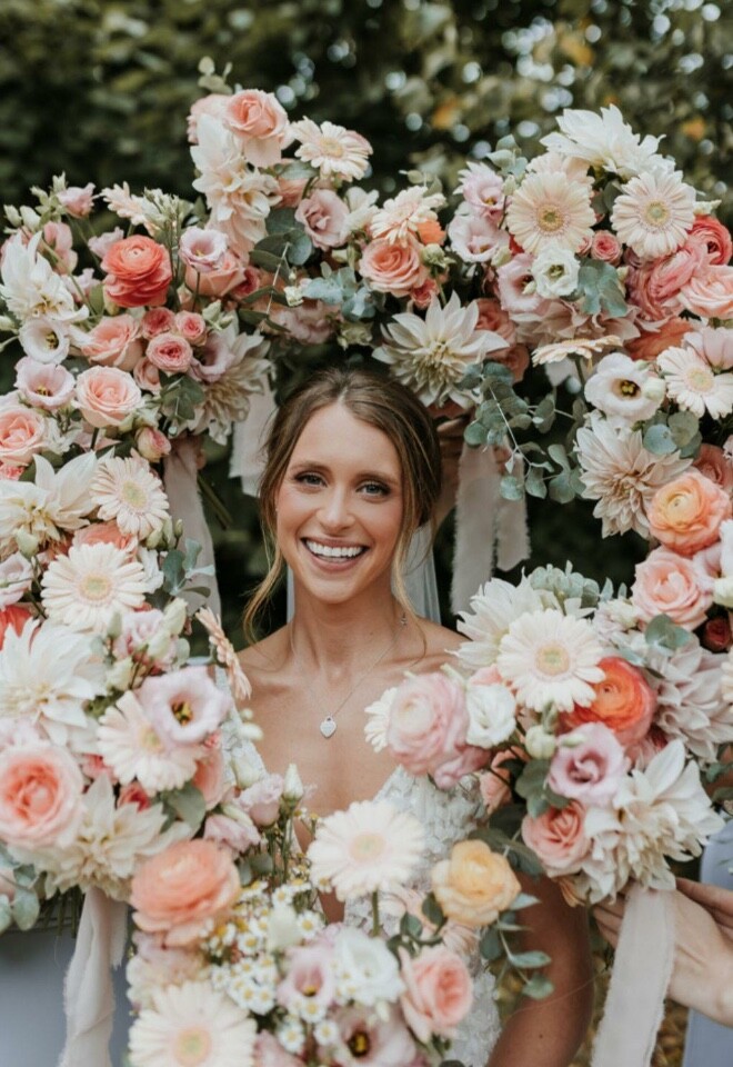 Beautiful bride and her bridesmaids flowers 