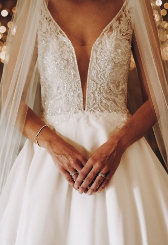 Bride with wedding bands from styled shoot at Caswell House