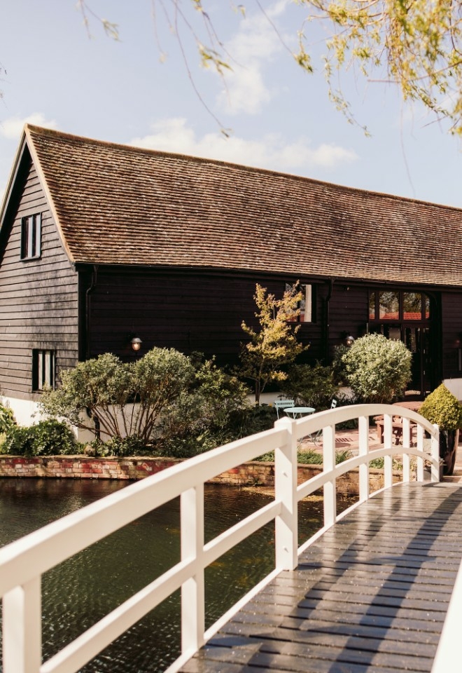 The bridge overlooking the ceremony barn at High House Weddings in Essex
