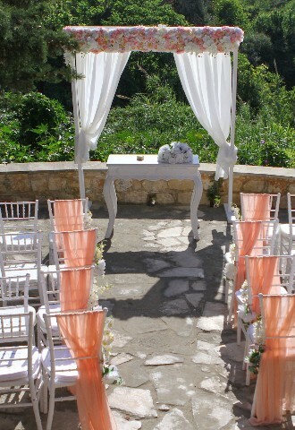 peach colour wedding reception set overlooking the stunning cyprus countryside