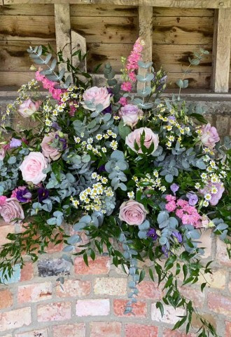 pink, blush and lilac flower arch with foliage and eucalyptus leaves made by ann laing flowers, harwell, oxfordshire