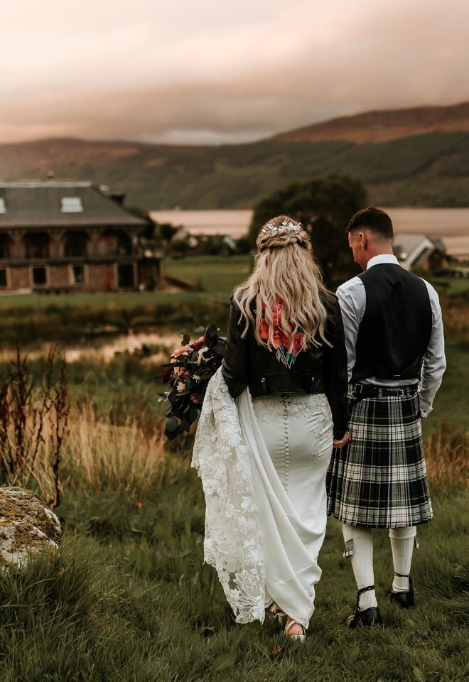 Bride and groom walking to Carrick Castle Estate