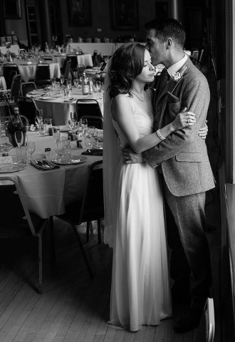 Couple embrace wedding reception at Worcester Guildhall