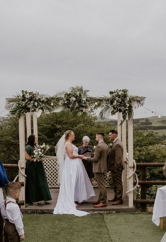 Outdoor wedding ceremony at The Stables Wedding Farm