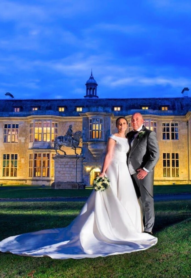 Hartwell House with a bride & groom at dusk