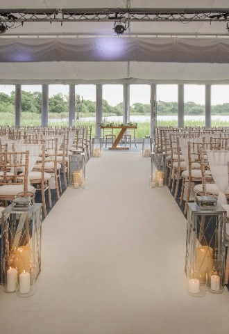 Wedding ceremony in the Whimbrel Marquee