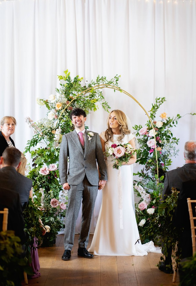 Floral arch with late summer flowers and foliage at The Barn at Alswick
