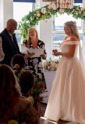 Celebrant Lisa with bride and groom at Oceanside
