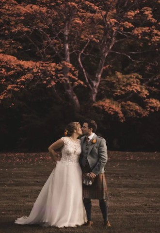 Wedding couple in the grounds at Melville Castle - a castle wedding venue near Edinburgh