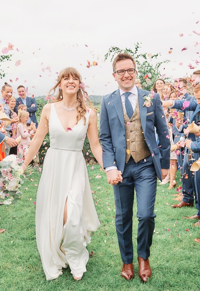 Barn Drift Wedding bride and groom confetti by Stuart Wood