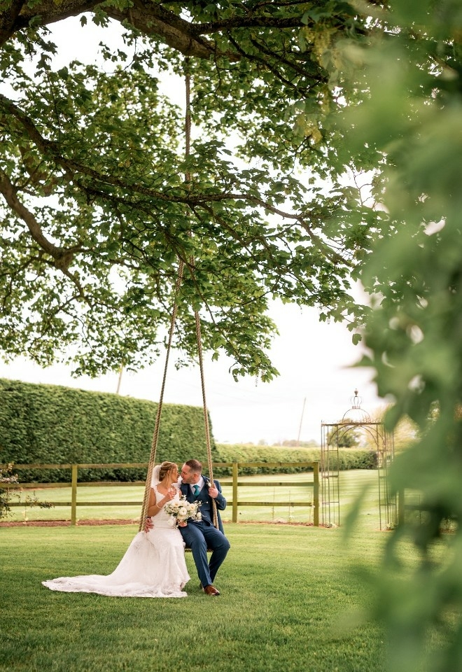 tree swing, bride & groom wedding photo at burlton manor