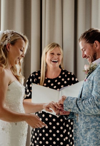 Celebrant Lisa with bride and groom at The Headland Hotel