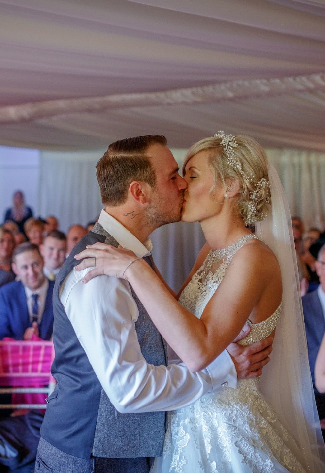 First Kiss - Happy Couple - at Southdowns Manor