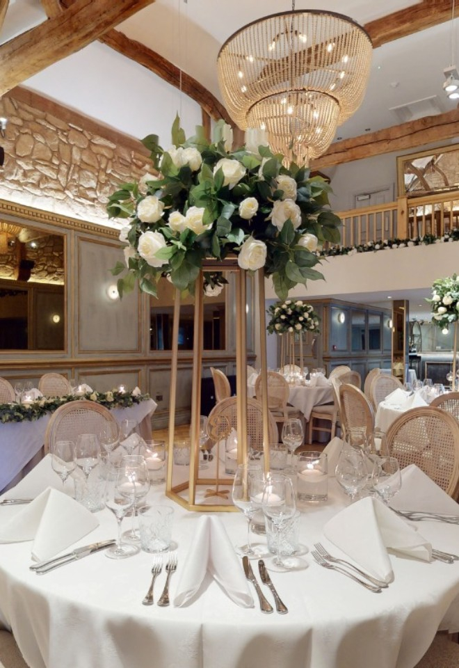 Table centre pieces at the barn for The Manor Greasby in Merseyside for wedding reception