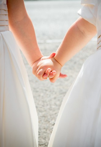 Bridesmaids holding hands