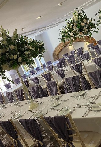Hire Heaven Table centre pieces chair sashes Missenden Abbey