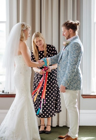 Celebrant Lisa with bride and groom at The Headland Hotel