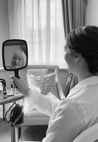 Bride checking her hair as her mother watches on, MB Events