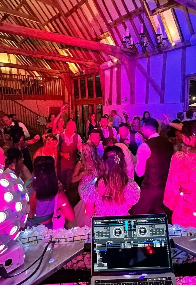 Wedding DJ, dance floor with people dancing