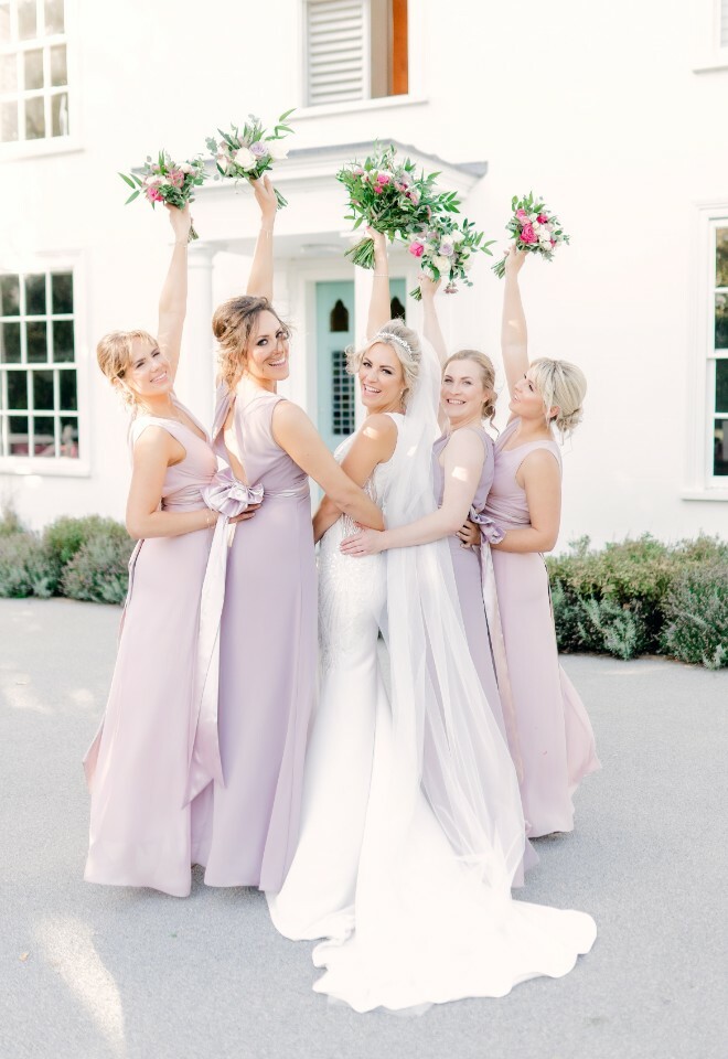 Bride and her Bridesmaids outside Vaulty Manor