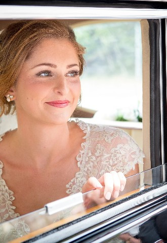Bride arriving at her Wedding Ceremony in carriage