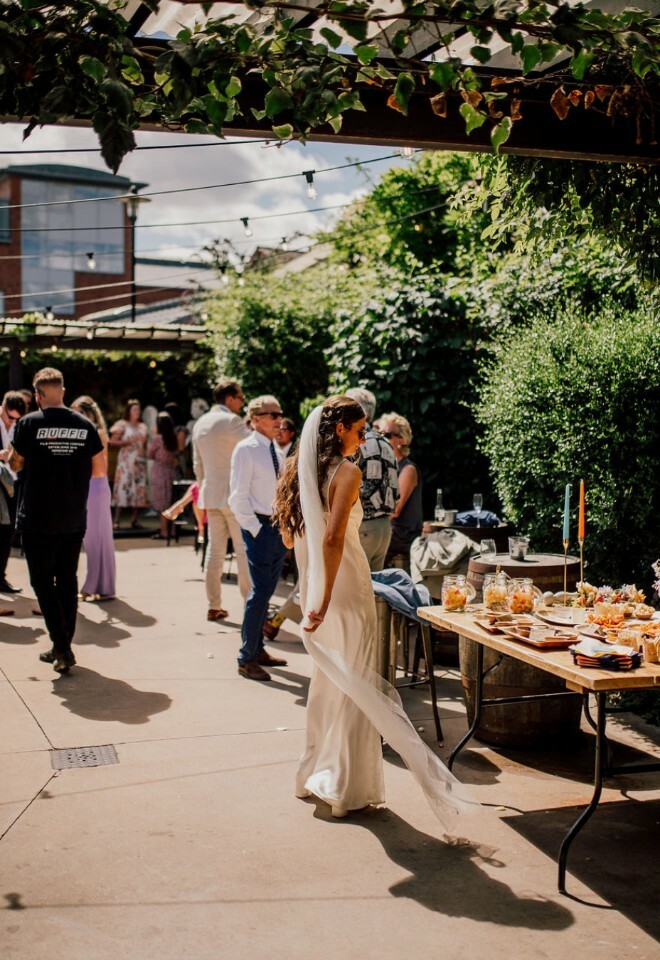 Candid shot of bride in outdoor space 