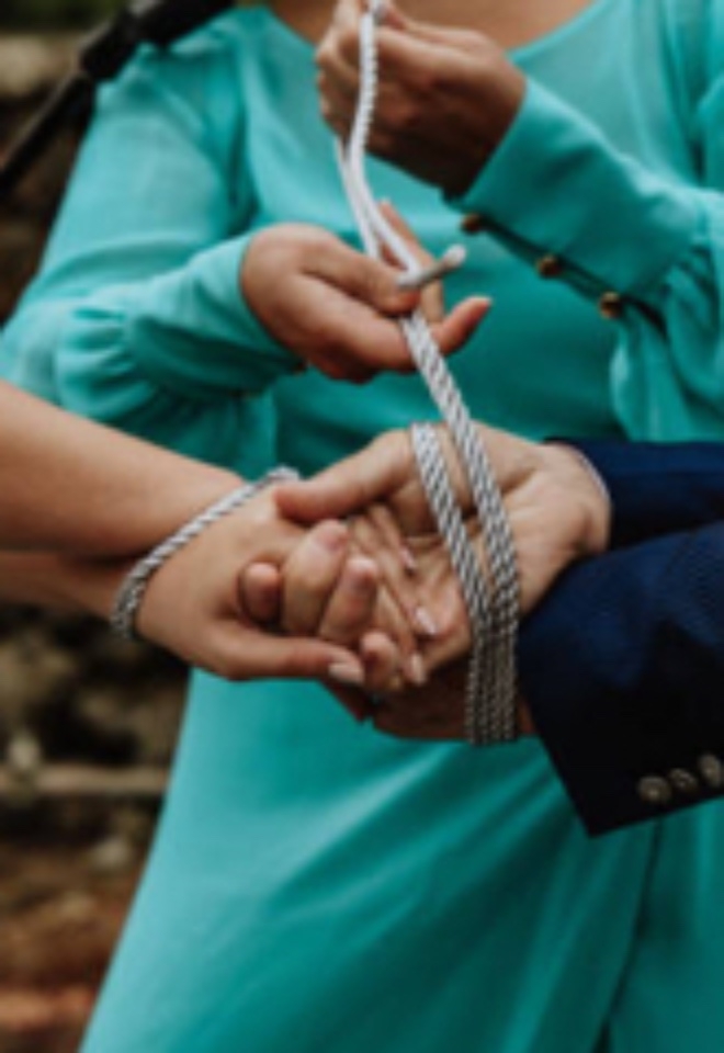 Hand fasting ceremony at a humanist wedding - YOLO Ceremonies
