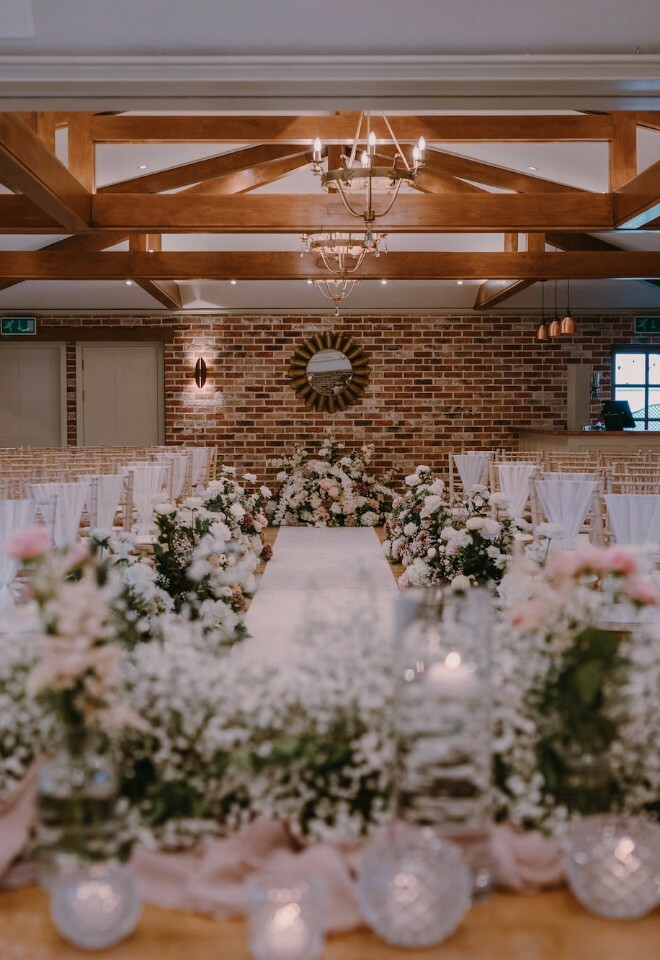 TJ Designer Weddings floral displays at Mulberry House, Copper Suite, Essex