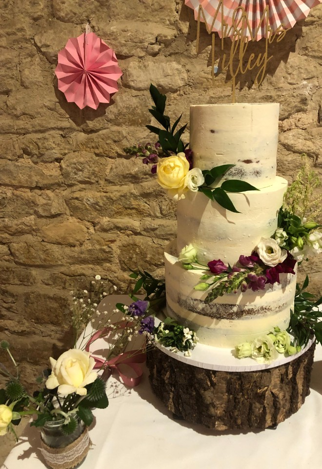 Naked wedding cake with real flowers