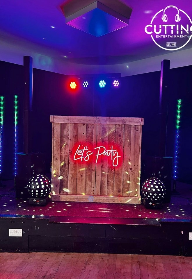 Lets Party dj booth with disco balls either side, wedding DJ in Suffolk & Essex