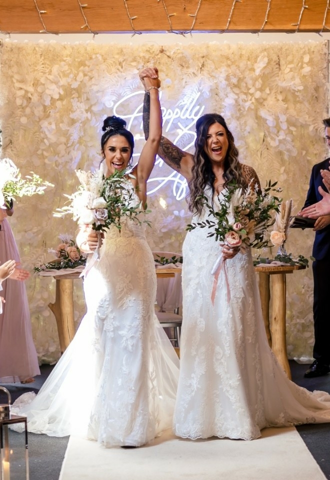 Brides just married Mrs & Mrs Edwards marry at Heaton House Farm Barn, Macclesfield