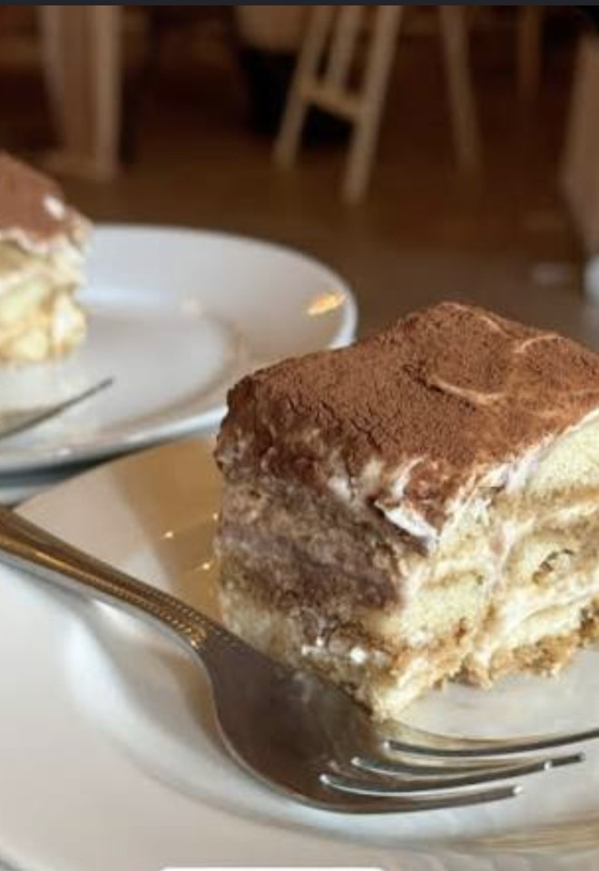 Traditional Italian Tiramisu wedding cake by Oxfordshire-based Dolce Lusso Cakes, with layers of coffee-soaked sponge, cream and cocoa.