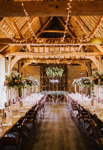 barn wedding breakfast, tables capes, table decor, floral table decor, pretty table, rustic barn, fairy lights,