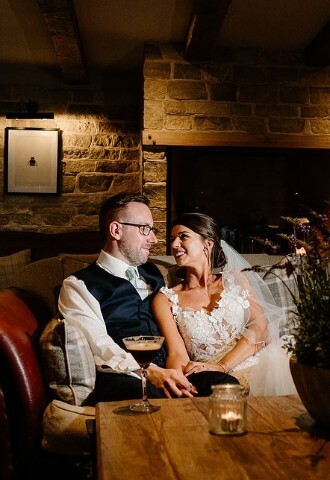 Bride and Groom with Cocktail at Wild Thyme and Honey in Gloucestershire