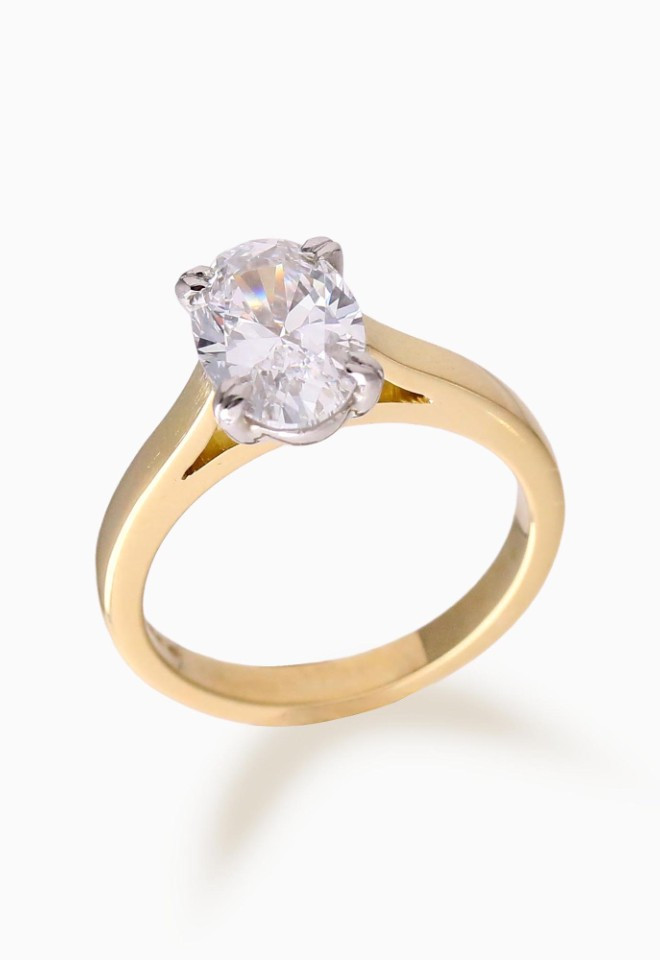 Bespoke handmade oval labgrown diamond engagement ring in yellow gold