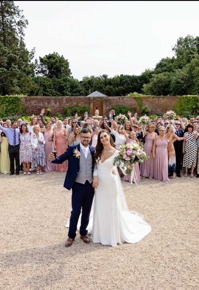 Bride and groom with guests at Elmhay Park